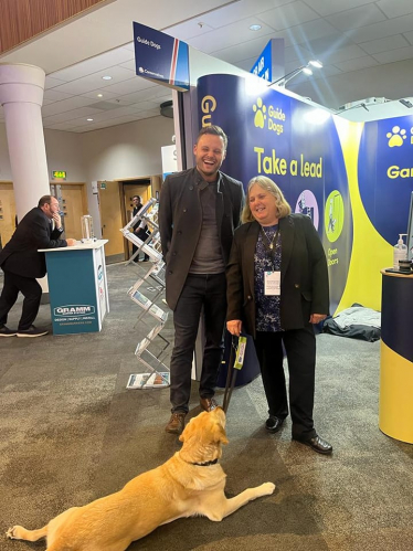 Ben at the Guide Dogs stand at conference